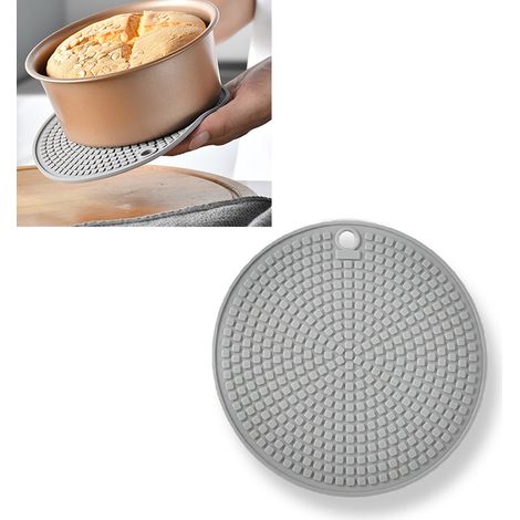 Dessous de plat en silicone isolants et antidérapants, ronds, pour la cuisine et les plans de travail de table et de salle à manger. (1/5)