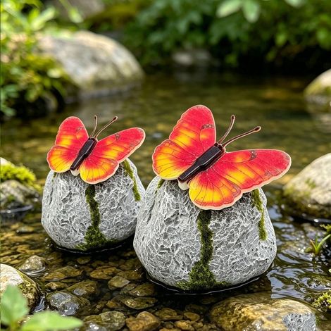 Lampe jardin lumineuse forme papillon texture pierre résine ornement