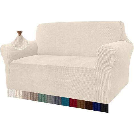 Housse beige moderne pour canapé 3 places, en jacquard, élastique.