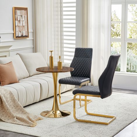 Ensemble repas complet : table ronde 60 cm en panneau MDF finition noyer, piètement métal doré, avec 2 chaises design noir à motif géométrique, cadre doré, idéal coin repas. (1/5)
