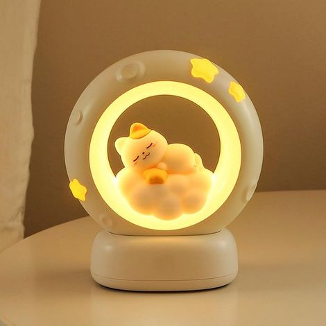 Esta luz nocturna infantil es recargable,tiene forma de gato,controles táctiles y funciona con pilas. Es ideal para el escritorio (1/5)