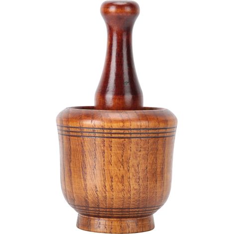 Ensemble mortier et pilon en bois pour broyer l'ail, le gingembre et les épices.