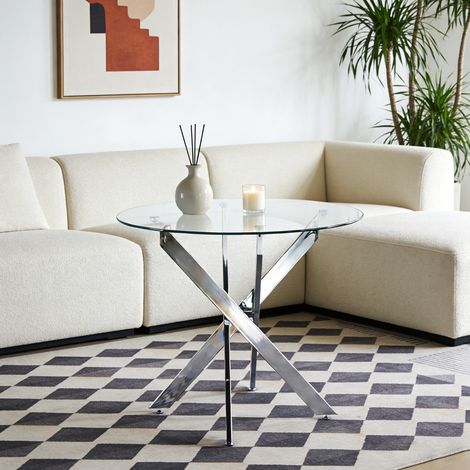 Mesa de comedor redonda 80x80x75 cm plateada en vidrio y metal con patas cruzadas y diseño estable (1/4)
