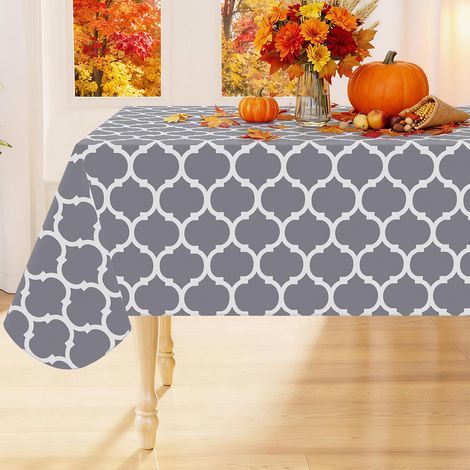 Nappe rectangulaire en vinyle imperméable avec envers en flanelle, facile à nettoyer et résistante aux taches. (1/5)