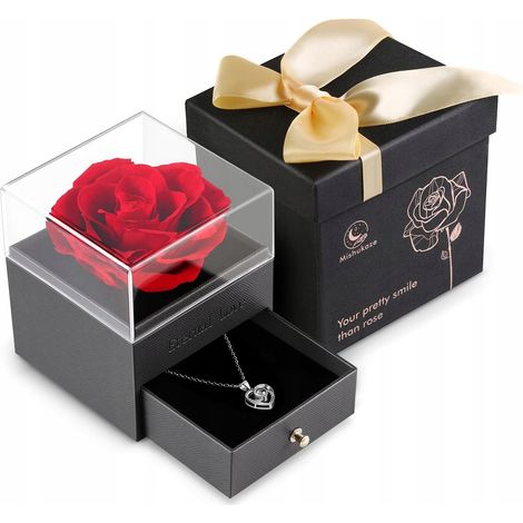 Rote Rose mit Kette, Blättern und Geschenktüte (1/4)