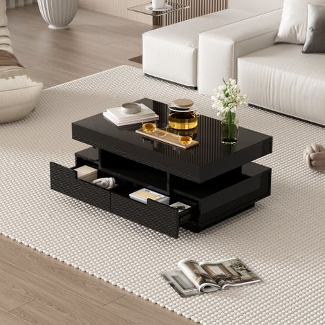 Table basse à finition haute brillance, dotée d'une bande lumineuse LED, de quatre tiroirs (à l'avant et à l'arrière) et d'un vaste espace de rangement. (1/5)