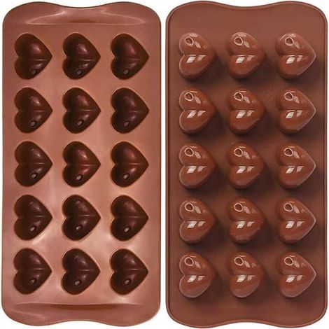 Zwei herzförmige Schokoladenformen aus Silikon, geeignet für Pralinen, Kuchen, Gelees, Puddings und Fondant. Hergestellt aus antihaftbeschichtetem Silikon. (1/3)