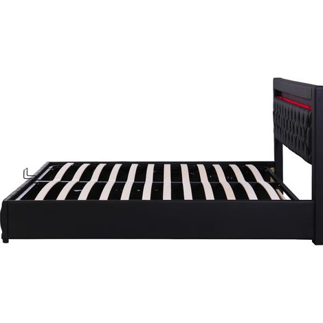 Cama tapizada 140 x 200 cm con somier, arcón de almacenaje y LED, negra, PU (1/5)