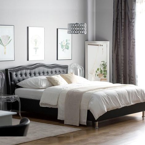 Lit capitonné 140x190 en similicuir noir – Structure à lattes – Confort optimal avec tête de lit rembourrée – Dimensions 207x174x94 cm – Meubler Design (1/5)