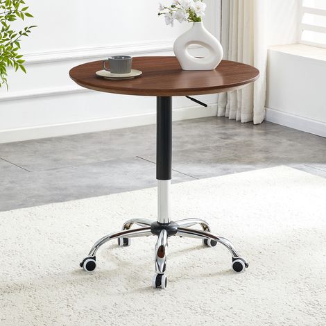 Mesa regulable en altura de MDF color nogal y metal cromado, Ø 70 cm, redonda con ruedas