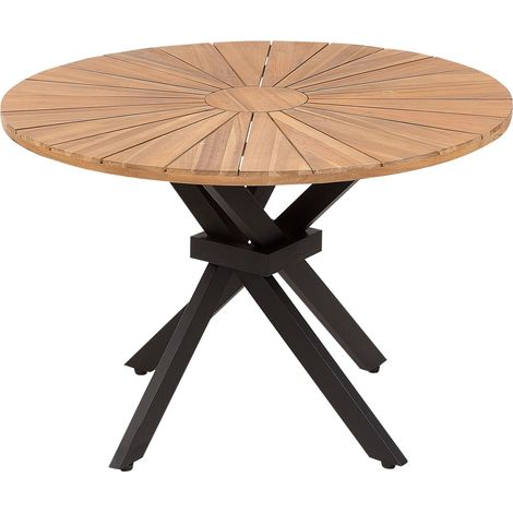Beliani – Table de jardin ronde en bois d'acacia 110 cm – 4 places – Base en métal noir – Finition huilée – Résistante aux intempéries (1/5)