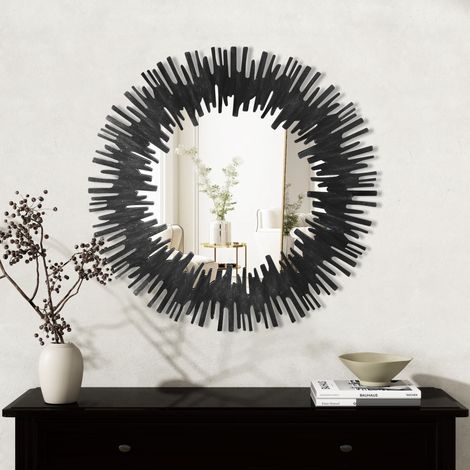 Miroir mural rond avec cadre à motifs radiants en noir, style moderne audacieux pour la décoration intérieure (1/5)