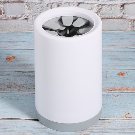 Nettoyeur de pattes pivotant pour animaux de compagnie, chats et chiens, en silicone souple ABS gris. (1/5)