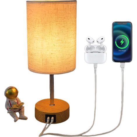 Esta lámpara de mesilla táctil cuenta con puertos de carga USB-A y USB-C, tres niveles de ajuste de luz cálida y una pantalla de lino. (1/4)