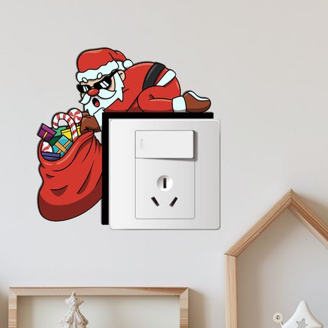 Cinque adesivi con l'immagine di Babbo Natale come interruttore, ideali per decorare le prese elettriche di casa e della stanza, oppure come adesivi murali. (1/4)