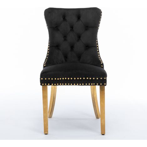 Lot 2 chaises salle à manger velours noir et or, dossier capitonné, piètement acier inoxydable doré, garniture cloutée, bois massif, collection Nikki