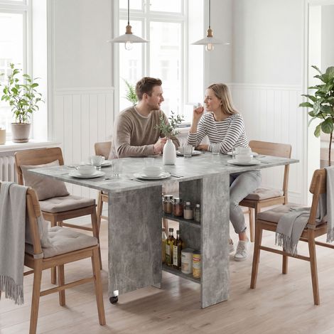 Table de cuisine pliante à roulettes, 2 étagères de rangement et 2 rallonges rabattables, style moderne, 75 x 140 x 74 cm, gris ciment (1/5)