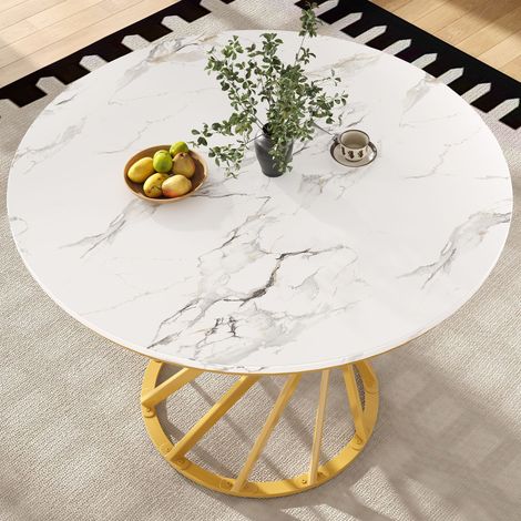 Ensemble repas 5 pièces : table ronde 80 cm diamètre, piètement métal doré, plateau MDF blanc, 4 fauteuils velours gris anthracite, style contemporain.