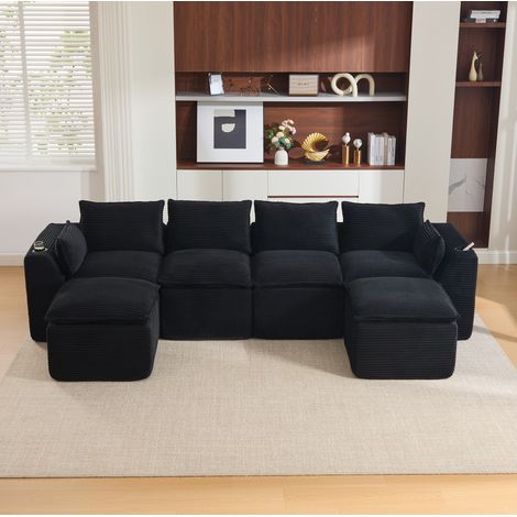 Canapé modulable 4 places en velours côtelé noir avec 2 poufs, coussins, porte-gobelet et poches latérales (1/5)