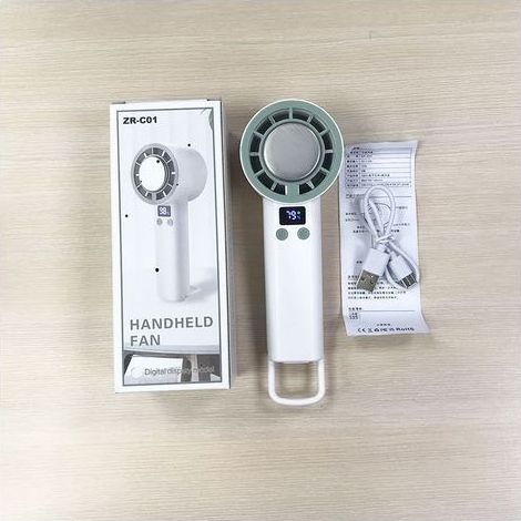 Ventilateur portable silencieux et rechargeable à 5 vitesses – Débit d'air élevé, blanc, idéal pour la maison ou comme support abdominal (1/4)