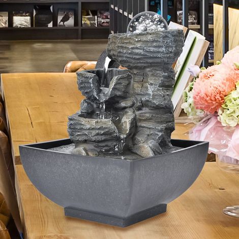 Petite fontaine décorative en résine avec jet d'eau et lumières, idéale pour l'aménagement paysager. Taille standard européenne 220 mm. (1/5)