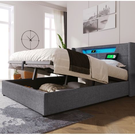 Letto matrimoniale imbottito con contenitore 160x200 cm in lino grigio, testiera LED con USB e Type-C, rete a doghe