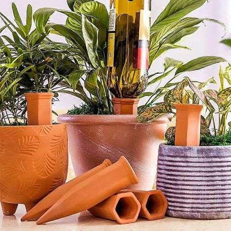 Lot de 4 inserts pour pots de fleurs en argile à arrosage automatique, avec picots d'arrosage, pour l'arrosage des plantes pendant les vacances. (1/2)