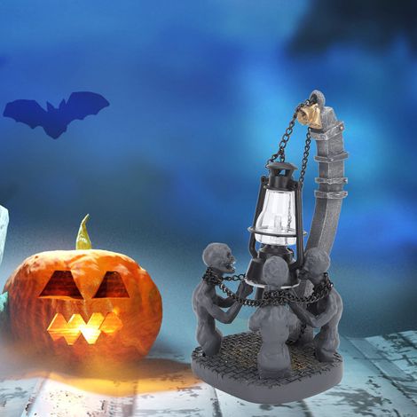 Vier Totenköpfe mit LED-Lichtern, eine gruselige Zombie-Lichterkette, eine Halloween-Dekoration für Zuhause. (1/5)