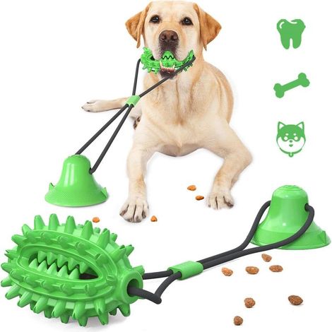 Cet anneau de dentition multifonctionnel pour animaux de compagnie est un jouet à mâcher muni d'une ventouse, fabriqué en caoutchouc thermoplastique, qui aide à nettoyer les dents de votre chien. (1/3)