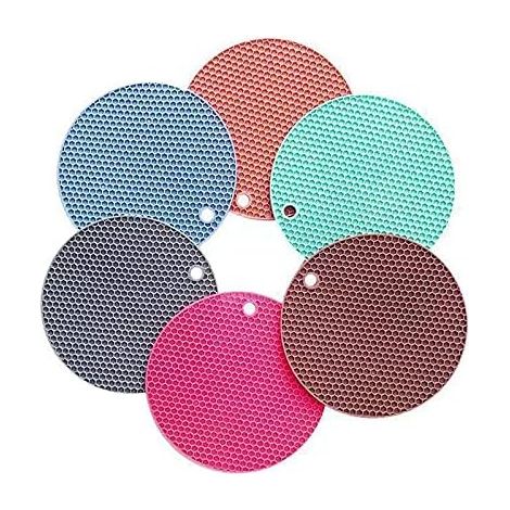 Dessous de plat rond en silicone isolant, épais et antidérapant, idéal pour la cuisine et la maison. (1/5)