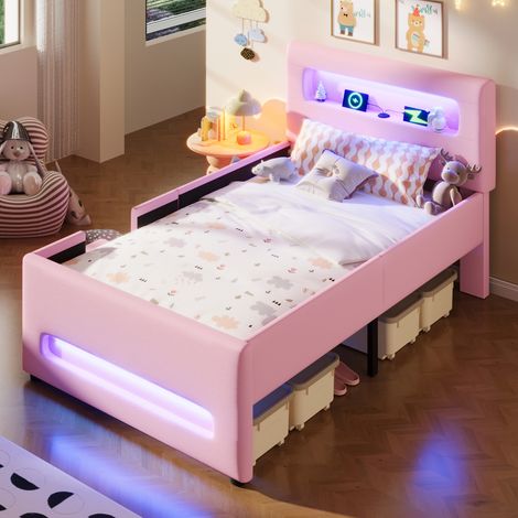 Cama plataforma tapizada en PU rosa de 90x200 cm con cajón, LED, USB y base de láminas.