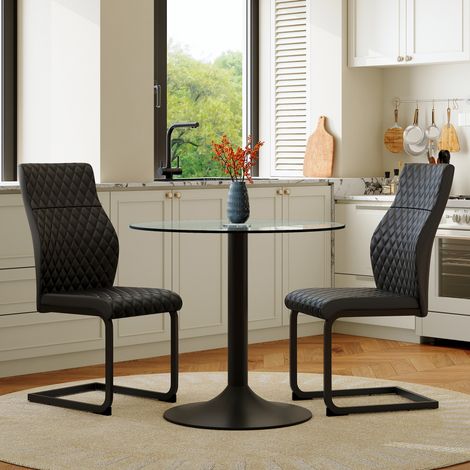 Table ronde verre 85 cm + 2 chaises salle à manger noires haut dossier capitonnage losanges polyuréthane (1/5)