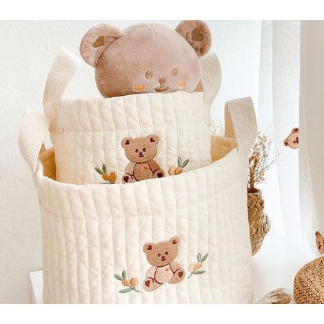 Cesto de ropa con forma de oso beige de , ideal para la habitación del bebé, almacenamiento infantil o decoración para niñas y niños. (1/4)