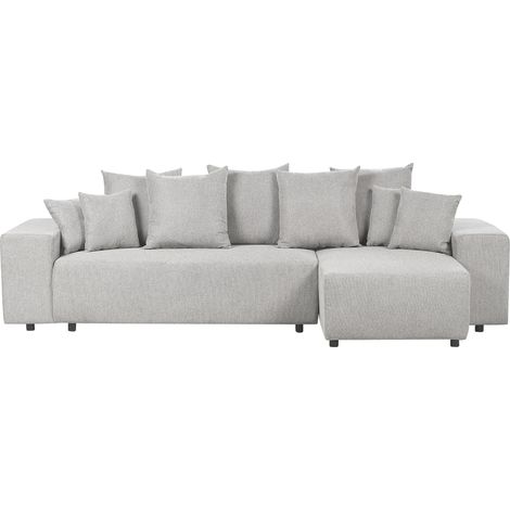 Sofá cama esquinero de tela con cojines estilo moderno a la izquierda en gris claro Luspa
