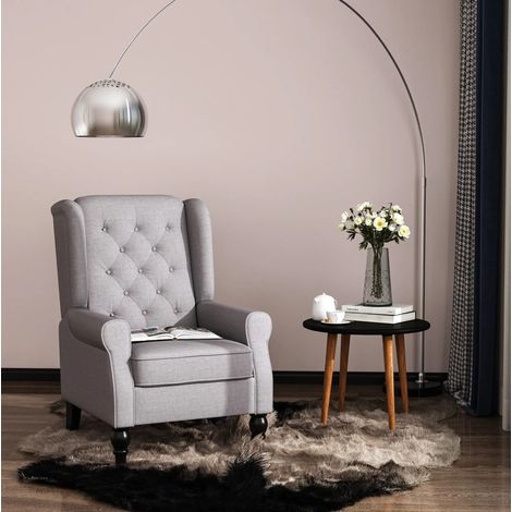 Sillón orejero 74x86x102 cm gris en poliéster con capitoné y respaldo alto (1/5)