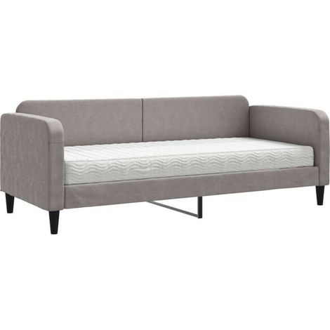 Le canapé-lit, mesurant 80x200 cm, est doté d'un matelas gris-brun et est recouvert de tissu. (1/5)