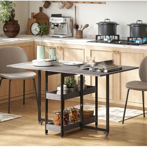Mesa de comedor plegable 133,4x80x75 cm gris en madera con 2 alas abatibles y ruedas con freno (1/5)
