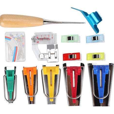Kit de fabrication de biais, comprenant un classeur à biais, un poinçon et des accessoires de couture pour la finition de courtepointes. (1/5)