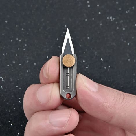 Mini couteau à pousser en titane pur alliage de titane porte-clés Portable tranchant déballage ouverture Express
