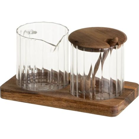 Un juego de azucarero y lechera sobre una bandeja de madera. (1/5)