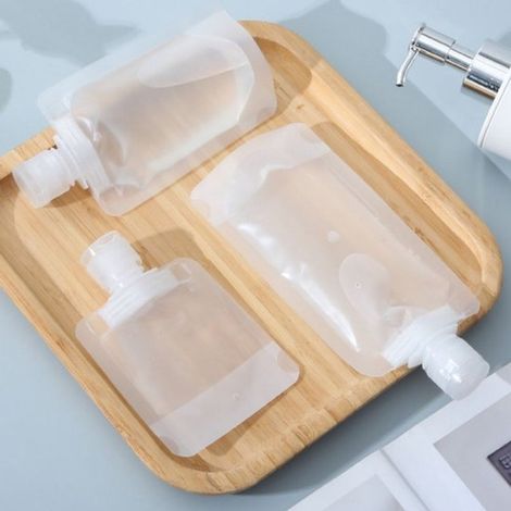 50 Stück，Wiederverwendbare Reiseflaschen，Hübsche Reiseaccessoires，Shampoo- und Lotionbeutel，Leere Kosmetikbehälter für Flüssigkeiten，100 ml (1/4)