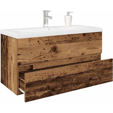Waschbeckenunterschrank mit Einbaubecken und Wasserhahn