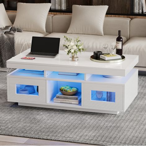 Mesa de centro 100x50x43 cm blanca en aglomerado con acabado brillante, LED RGB, enchufe y USB, con almacenaje (1/5)