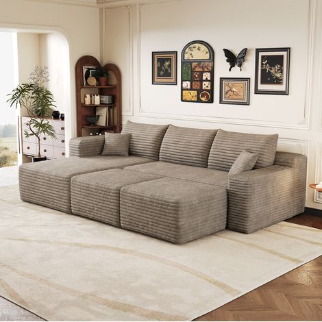 Divano angolare modulare reversibile, non richiede montaggio, seduta profonda, tessuto effetto velluto a coste color cammello. (1/5)