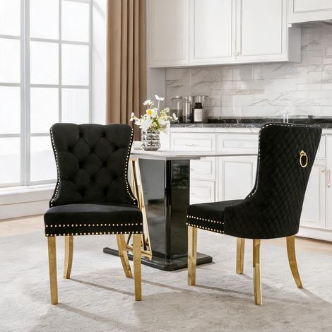 Chaise de salle à manger en velours noir et or avec anneaux (1/5)