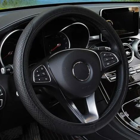 Coprivolante nero adatto per parti automobilistiche (37-38 cm) con motivo a rilievo, in pelle sintetica a doppia fibra resistente all'usura, senza anello interno, elastico e guanti antiscivolo. (1/4)