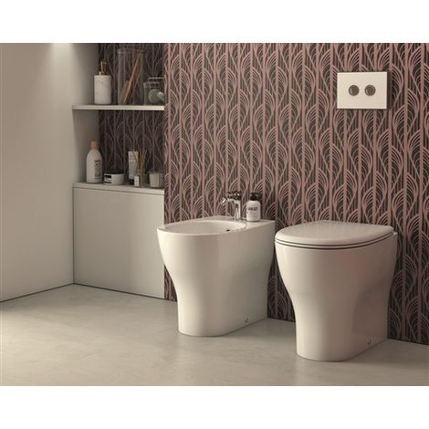 Sanitari Grace filomuro senza brida scarico traslato cm. 52x36