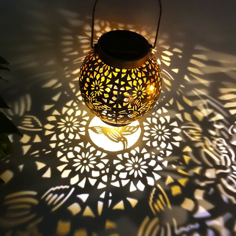Lámpara de proyección esférica para terraza y jardín, con motivos de mariposa, libélula y colibrí, fabricada en metal. (1/5)