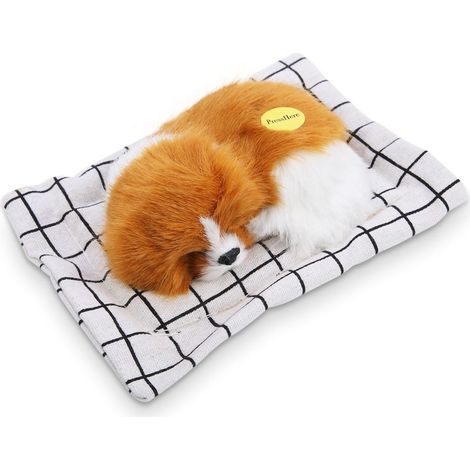 Une peluche chien endormi qui émet des sons, idéale pour les enfants, de couleur jaune et blanche. (1/5)