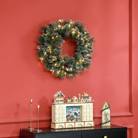 Ghirlanda natalizia artificiale per porta, 60 cm, con pigne e grappoli di bacche, luci a LED e timer verde. (1/5)